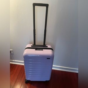 Limited edition lilac AWAY bigger carry-on! Only used once!